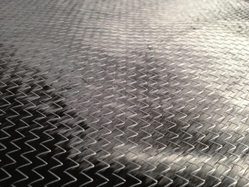 TK Industries, acquired by Mitsubishi Rayon in October 2012, is developing improved carbon fibre fabrics for the automotive sector.