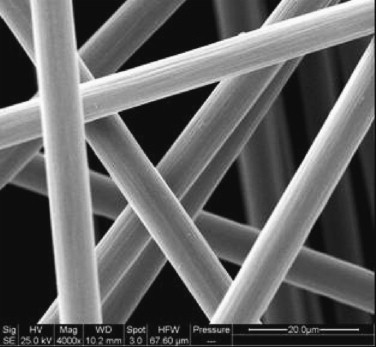 Scanning electron micrograph (4000x magnification) of the recycled carbon fibres treated with supercritical 1-propanol at 350C. The fibres appear to be totally clean and almost resin-free.*