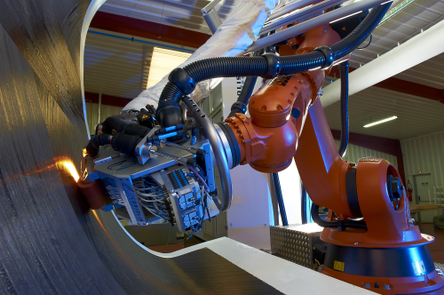 Coriolis Composites utilises a standard off-the-shelf poly-articulating robot arm as the basis for a fibre placement system having eight axes of motion. (Picture courtesy of Coriolis Composites.)