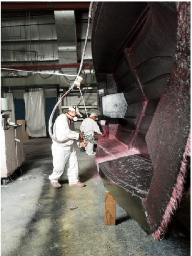 OptiSpray is an example of Owens Corning's 'best in class' agenda. This picture shows Regal Boats operators spraying Owens Corning's OptiSpray rovings onto a complex mould. Regal has found that OptiSpray reduces the amount of resin it uses, leading to savings in both money and boat weight.