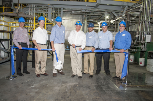 AOC unveils its new vinyl ester reactor at its Lakeland, Florida manufacturing facility.  (Left to Right) Emilio Oramas, Vice President, U.S. & Canada Sales; Fred Norman, President & CEO; Michael Diehl, Plant Manager; Matt Watkins, Sr. Vice President Operations; Ali Shihaibar, Plant Engineer; Dan Cox, Director, Operations; and Craig Mynatt, Project Engineer.