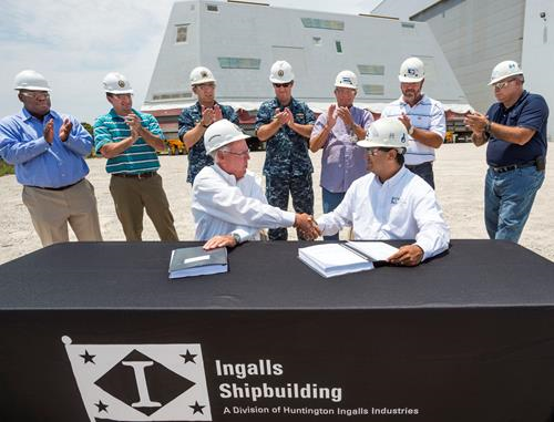 The Michael Monsoor (DDG 1001) composite deckhouse being signed over to the US Navy. (Photo by Lance Davis/HII.)