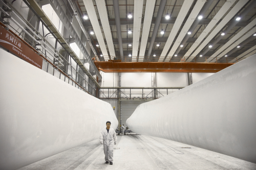 Wind blades ready for finishing at an LM Wind Power blade manufacturing facility in China. (Picture courtesy of LM Wind Power.)