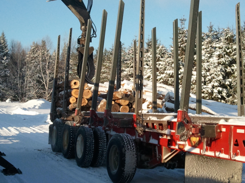 By reducing the weight of the trailer, more timber can be carried.