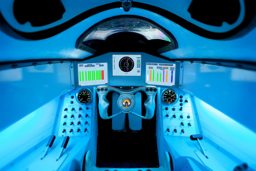 Inside the BLOODHOUND SSC cockpit. The central screen shows the speed in miles per hour and Mach number (Mach 1 being the speed of sound). The left-hand screen shows hydraulic pressures and temperatures in the braking and airbrake systems, while the screen on the right provides information about the three engines, including temperatures, pressures and fuel levels. (Picture: Stefan Marjoram.)