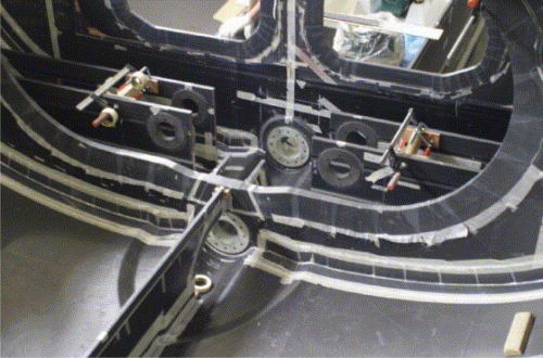 Major transverse and longitudinal stiffening were needed in the keel area. Note the canting keel pivots incorporated into the adjacent bulkheads. (Picture courtesy of Killian Bushe and Andrew Lowe.)