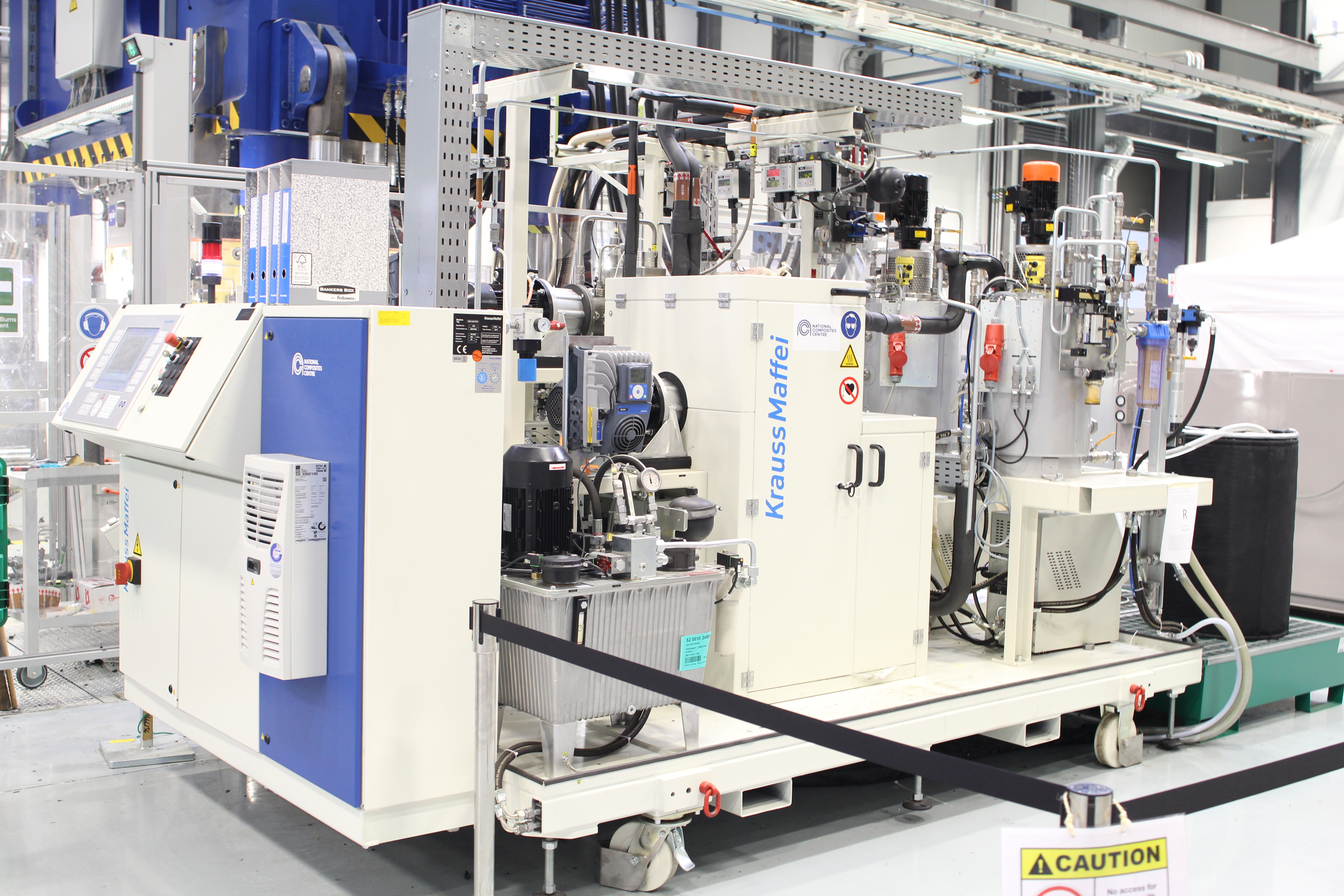 The KraussMaffei RimStar Compact 4/4/4 mixing and metering machine at the National Composites Center.