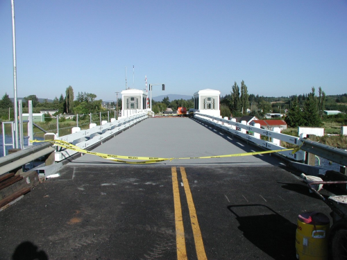 FRP deck and polymer concrete wear surface installed on Lewis and Clark River Bridge.