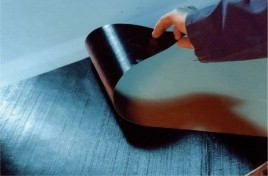 Prepreg laminating has been compared to upholstering.