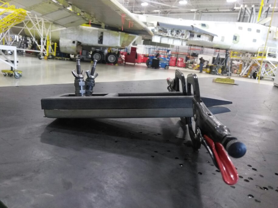 The first carbon fiber part 3D printed for the US Air Force: a first aid kit restraint strap for B-1 aircraft. (Photo courtesy Business Wire.)