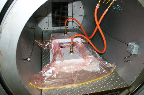 The composite structure was cured under vacuum in an autoclave to minimise voids. The bagging system needed considerable development to accommodate the complex geometry of the component.