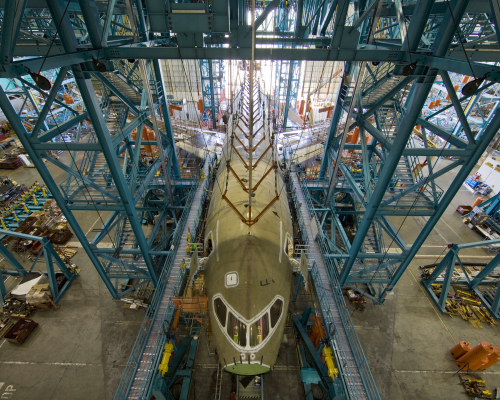 The full-scale static test airframe for the 787 Dreamliner in its fixture. Workers finished installing reinforcements within the side-of-body section of the airplane over the weekend. The modification will be tested on this airplane later this month.