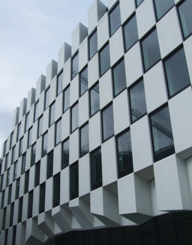 GRC facade at the Grand Canal Hotel, Dublin, completed by Ian Campbell. GRC offers freedom to create bespoke designed facades and architectural elements at a lower cost.