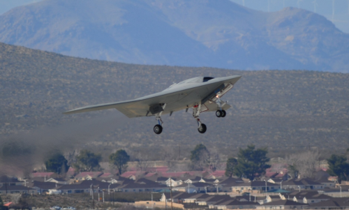 First flight of the X-47B unmanned combat aircraft.