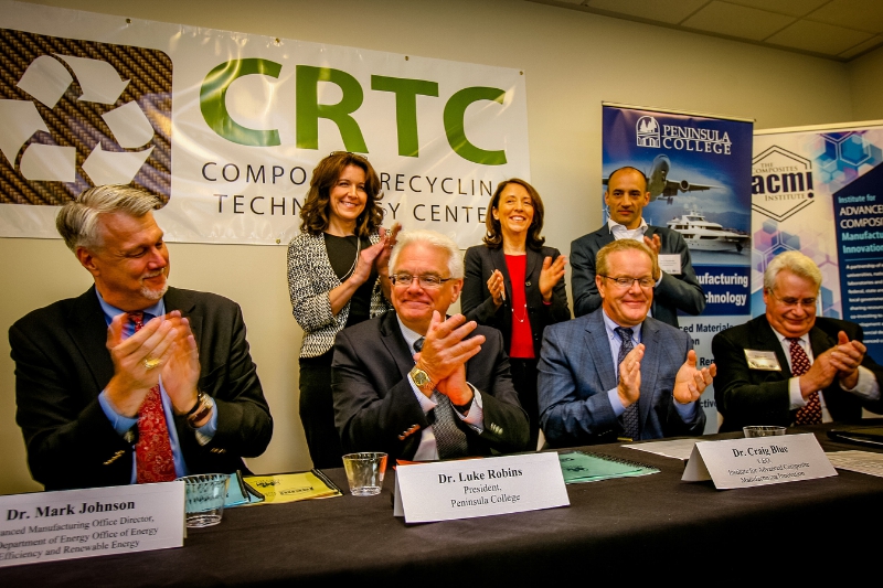 From left to right (front): D. Mark Johnson, director of the Department of Energy's Advanced Manufacturing Office, D. Luke Robins, president, Peninsula College, Dr Craig Blue, IACMI CEO, Robert Larsen, Composite Recycling Technology Center CEO, (back) Colleen McAleer, Port of Port Angeles president; Maria Cantwell, State of Washington senator; Brian Bonlender, Washington State Department of Commerce director.