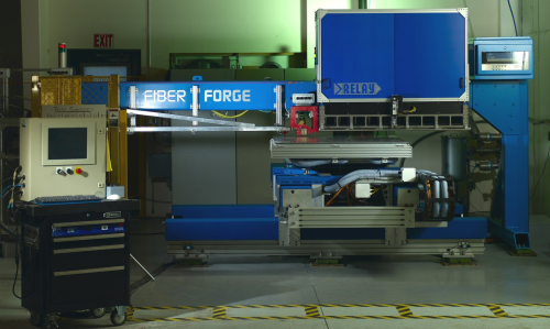Fiberforge’s Relay™ manufacturing system uses prepreg tape in an automated lay-up process to produce tailored blanks, which are thermoformed into finished parts.