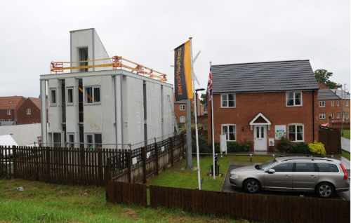 The demonstration Startlink House (left) next to Larkfleet's head office in Lincolnshire, UK.