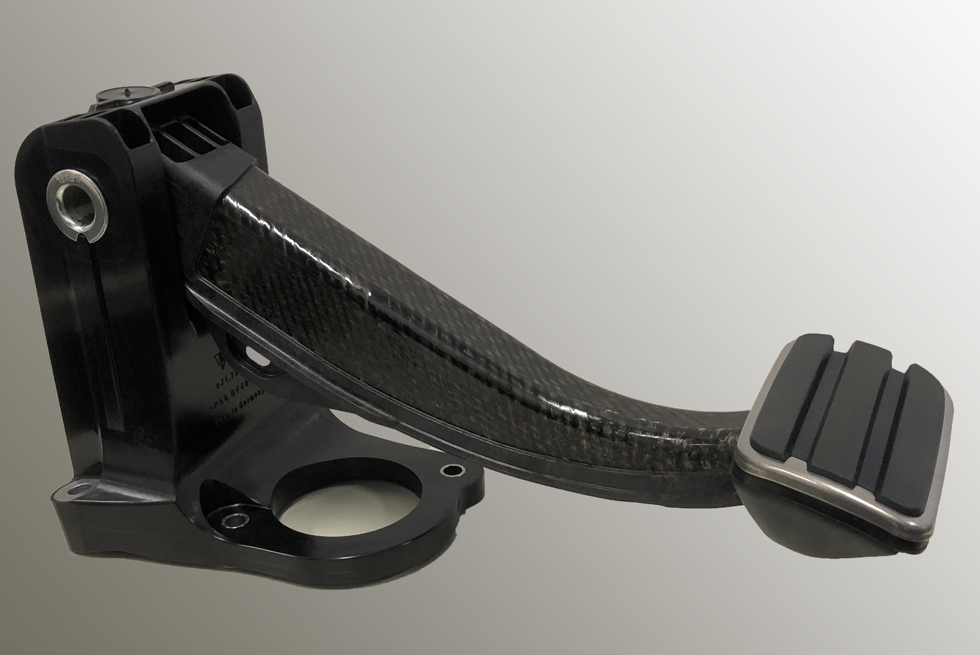The all-plastic brake pedal with an insert made from a continuous-fiber-reinforced thermoplastic composite. (Photo courtesy Lanxess AG.)