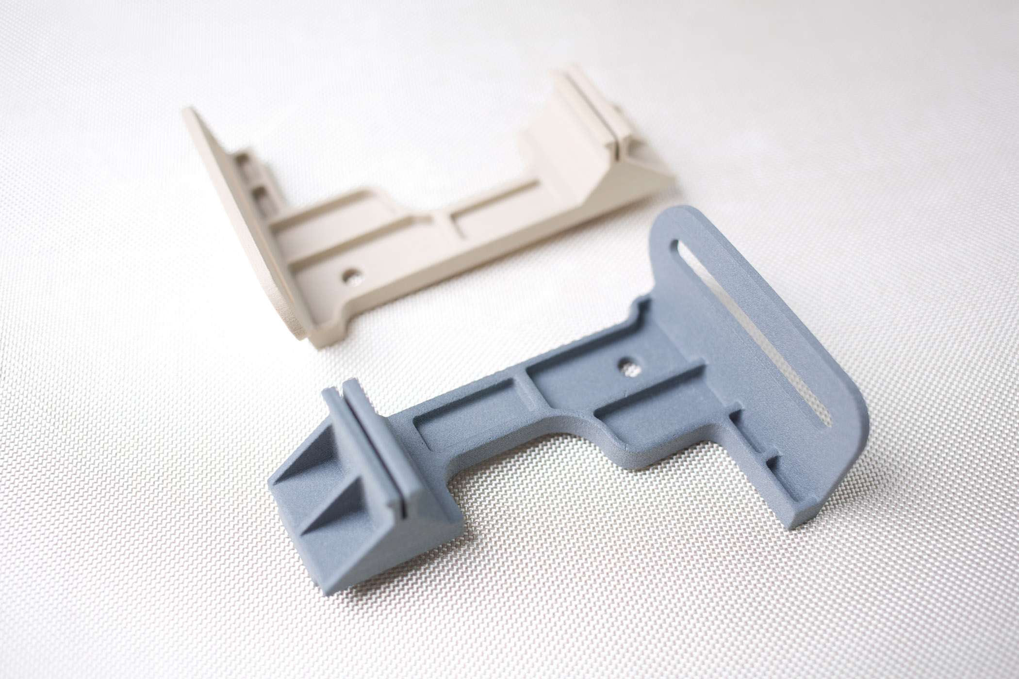 3D printed PAEK brackets for aerospace.