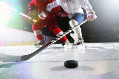 Ice hockey sticks used to be made of wood. Modern ice hockey sticks use materials such as carbon fibre and lightweight cores to produce sticks are lighter and that transfer energy to the puck in less time.