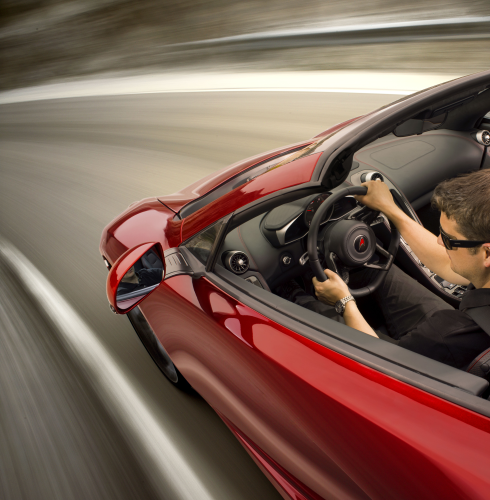 The twin-turbo V8-engined, open roofed 12C Spider. (Picture © McLaren Automotive Ltd.)