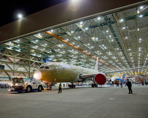 ZA004, the fourth flight test 787, being moved from the final assembly bay to a temporary facility at Aviation Technical Services (ATS), south of Paine Field in Everett, Washington. Boeing has leased hangar space from ATS to peform side-of-body modifications. (Picture © Boeing.)