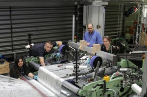 The AMRC Composite Centre’s Miran Sidhu, Joshua Oxley, Hassan El-Dessouky and Jody Turner, setting up the new loom.