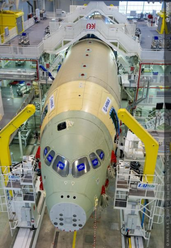 A350 XWB first front and centre fuselage in the assembly jig and ready for join-up. (Picture © Airbus. Photo by P. Masclet.)