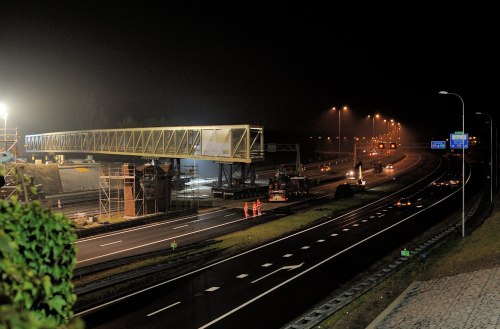 The FiberCore Europe bridge across the A27 motorway in the Netherlands features a load-bearing composite deck bonded to a steel frame. (Picture courtesy of FiberCore Europe.)