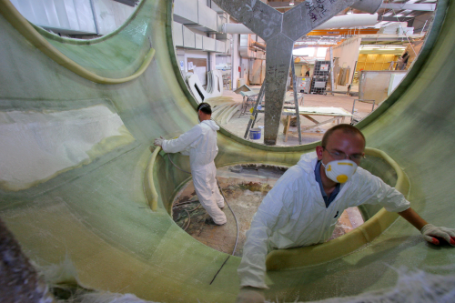 Markos workers finishing the interior of a 9 m long nacelle.