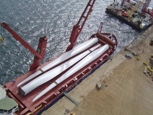 Transporting the large blade structures safely and economically is one challenge facing the wind power industry. (Picture courtesy of REpower.)