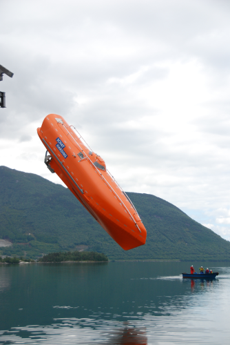 The redesigned FF1200 successfully passed the more stringent DNV-OS-E406 standard for an offshore free fall lifeboat, setting a record drop of 65.1 m. (Photo courtesy of Umoe Schat-Harding Equipment AS.)