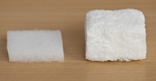 Nonwoven substrate foamed with Expancel microspheres.