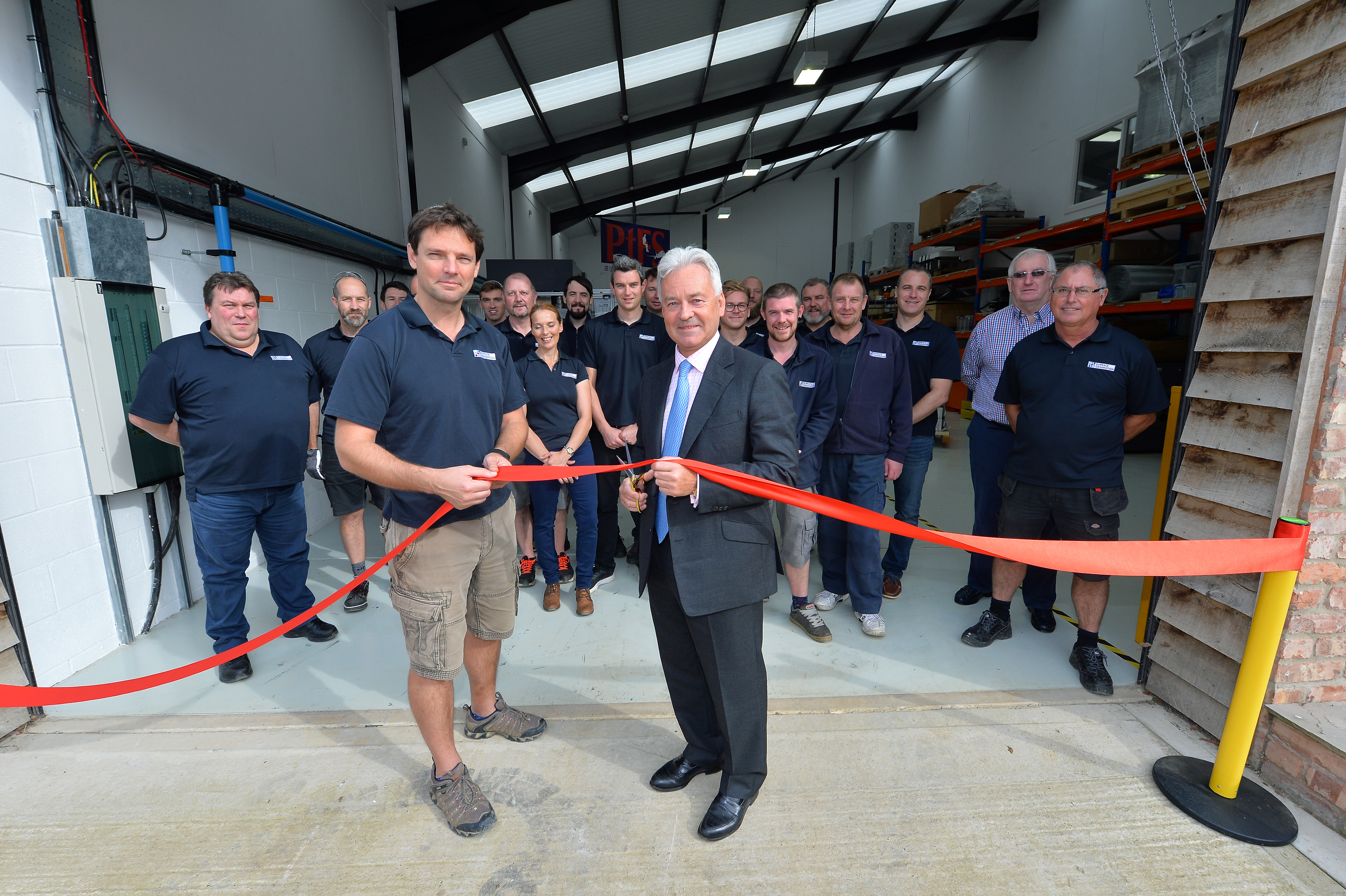 Sir Alan Duncan MP, who opened the facility, and chief exec Ben Halford cutting the ribbon.