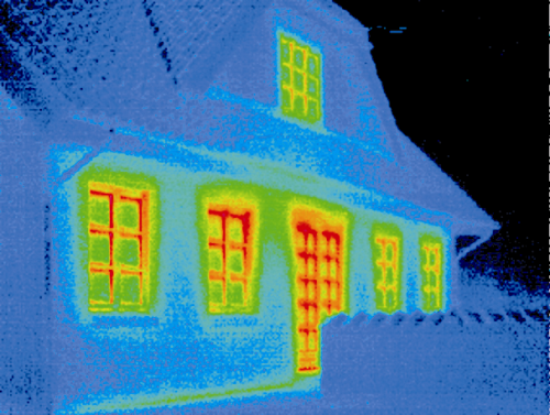 This thermographic image reveals that the highest heat loss (red) takes place through the window frames. It is estimated that more than one third of the energy used to heat buildings is lost through windows and doors.
