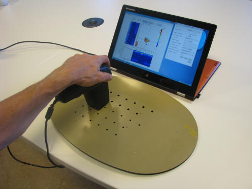 Figure 3: DolphiCam is attached to a PC for scanning the component to be tested.