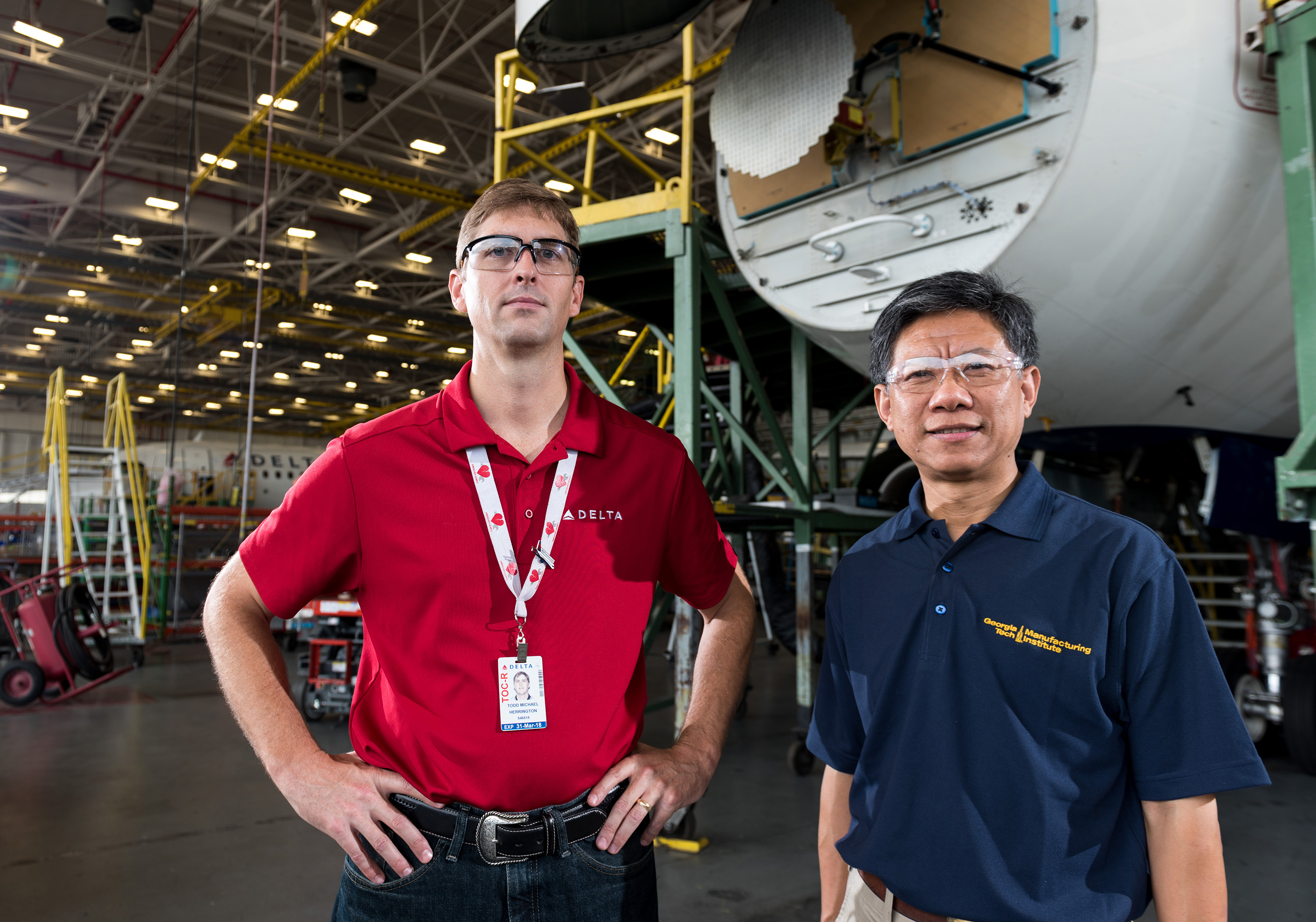 Todd Herrington, general manager of fleet projects at the company, and Chuck Zhang, a professor in Georgia Tech's Stewart School of Industrial and Systems Engineering. (Credit: Rob Felt, Georgia Tech)