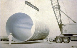 Figure 1: A 50 ft (15.2 m) long section of pipe being transported to site.