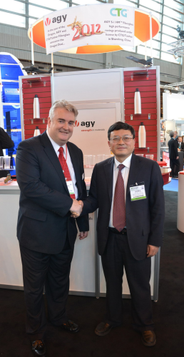Mr. Drew Walker, President and CEO of AGY (left) shakes hands with Mr. Zhiyao Tang, Chairman and President of CTG/Taishan Fiberglass (right) confirming the partnership between AGY and CTG/Taishan to produce S-1 HM™ glass fibre.