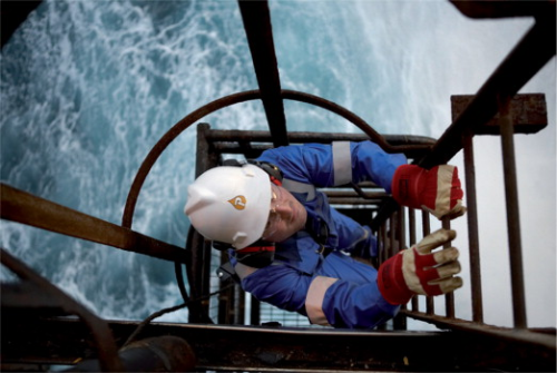 Offshore workers in both sectors must operate in an arduous and potentially hazardous environment. Hard-won H&S lessons can be shared (Courtesy, Petrofac Ltd).