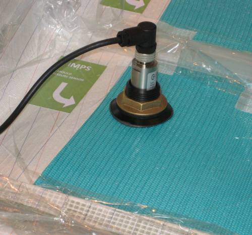 IMPS (In Mould Pressure Sensor) positioned through vacuum bag.