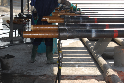 Figure 1: Duoline® D-20 liner being installed in an oilfield tubular by licensee MaxTube.
