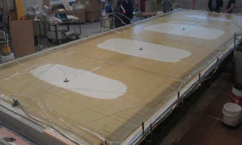 The bridge panels being manufactured in a vacuum infusion process. (Picture courtesy of Poly Products.)