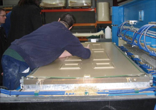 A GRP door skin under production at New World Developments.
