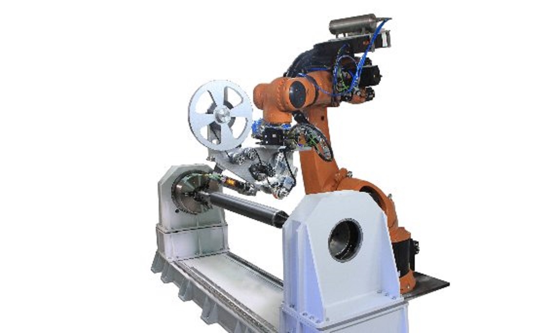 The AFP/ATL Robot Machine allows for fast transition from automated placement of fibers to automated laying of tape and vice versa, by changing the head.