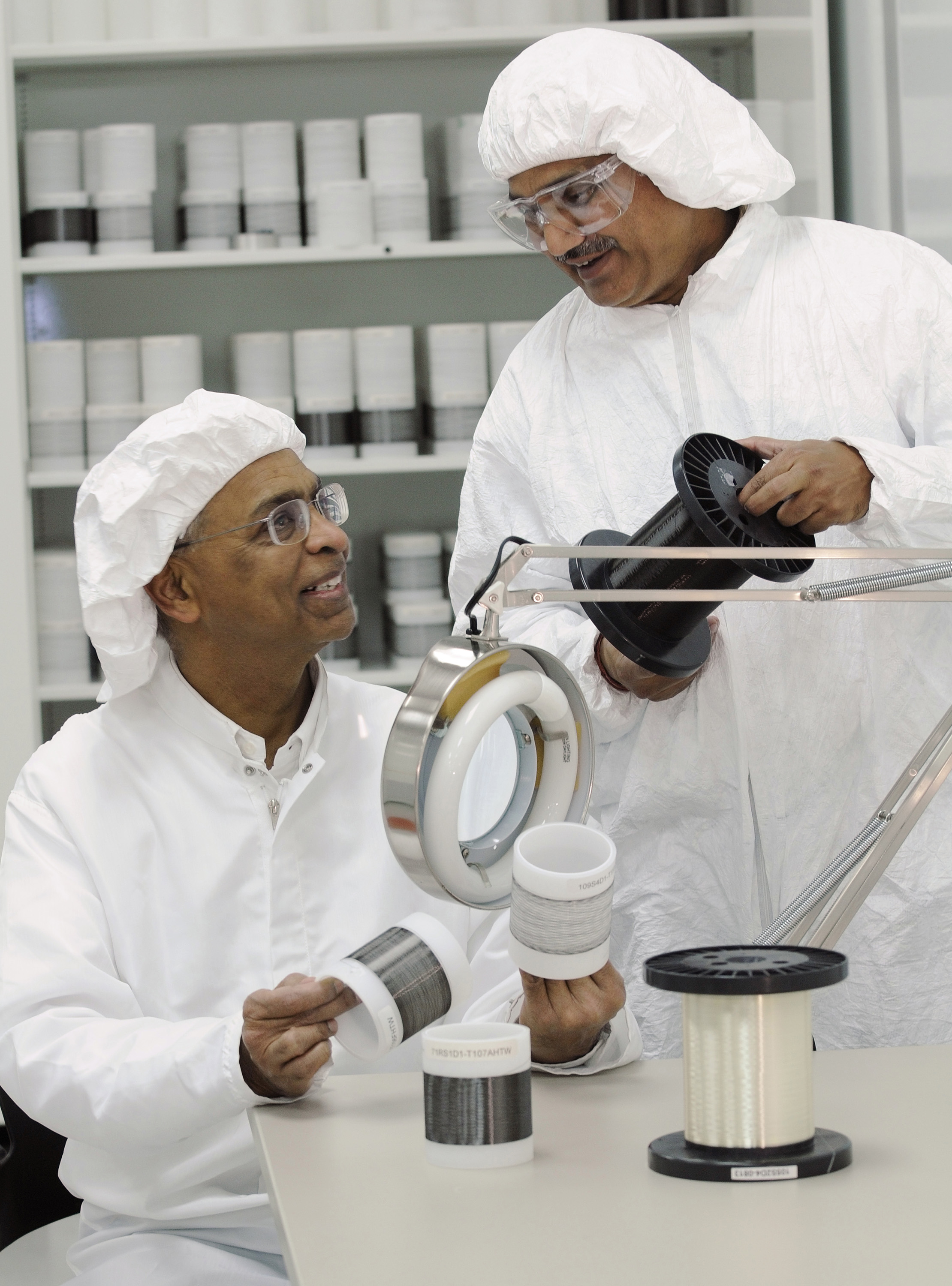 Professor Satish Kumar and research engineer M.G. Kamath examine the precursor and carbon fibers processed at Georgia Tech. (Photo courtesy Gary Meek, Georgia Tech.)