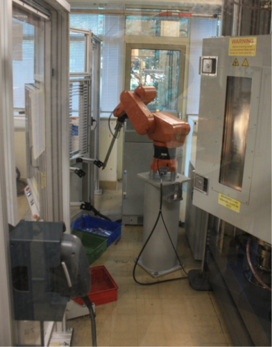 Hexcel's robot in operation handling the specimens from the magazine.