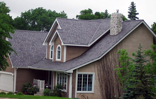 Enviroshake composite roofing shingles replicate the look of a spit cedar roof but with improved durability and less maintenance.