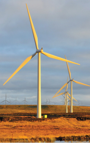 Europe's largest onshore wind farm at sunset, Eaglesham Moor, Scotland.